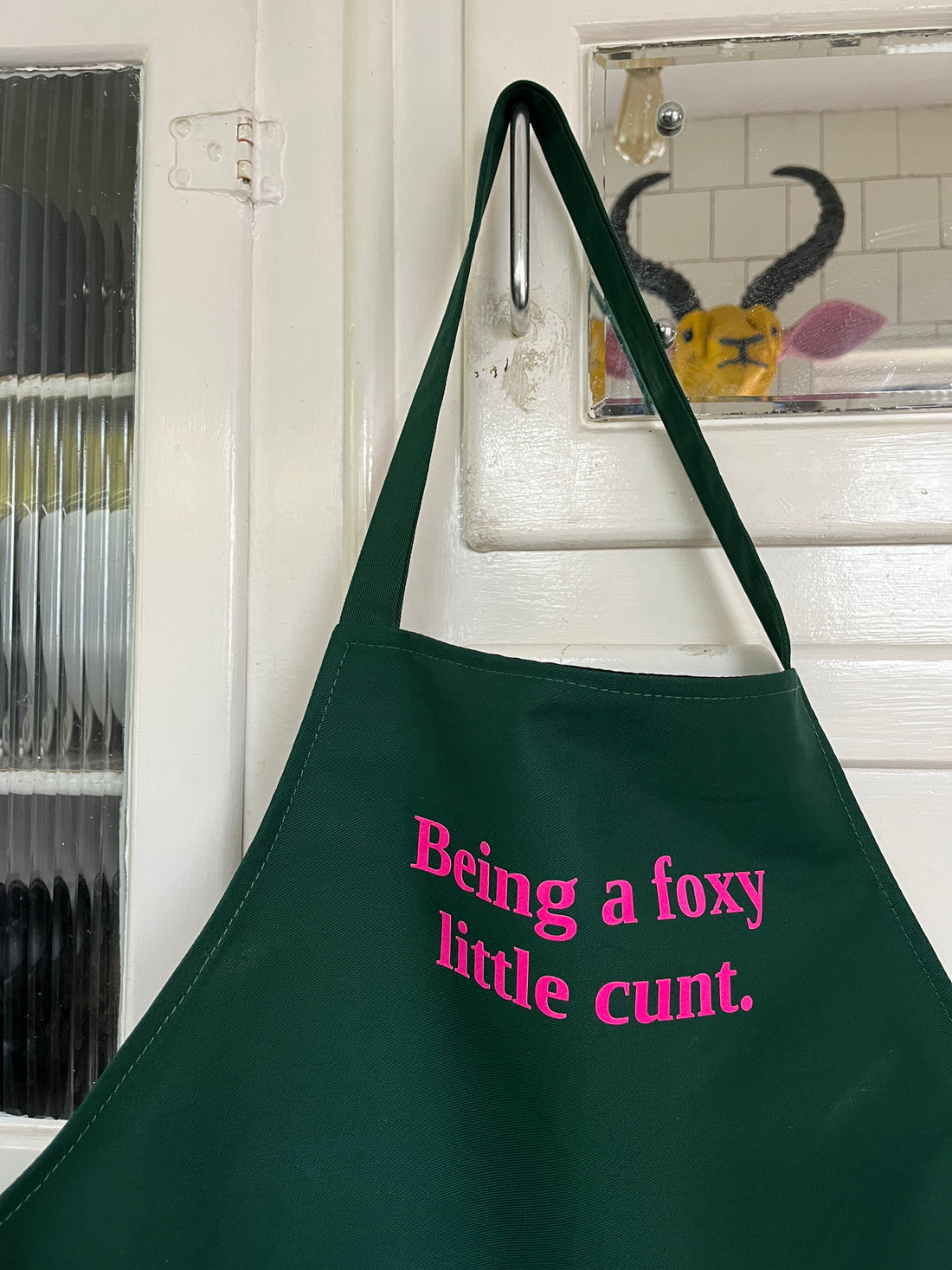 BEING A FOXY LITTLE ... GREEN COTTON APRON WITH PINK VINYL TEXT