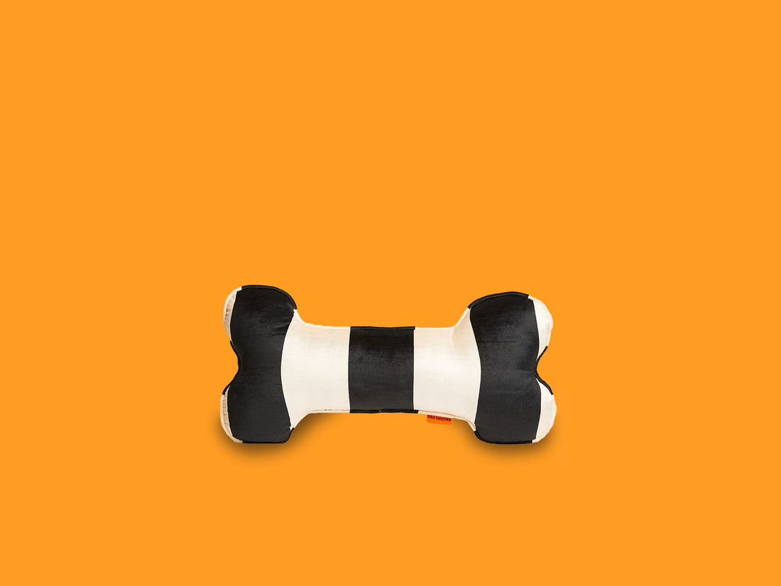 BONE SHAPED PILLOW