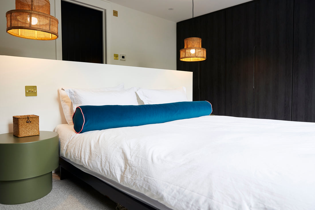 TEAL BOLSTER WITH PINK NEON PIPING